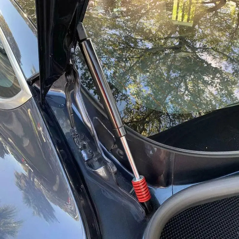 Tesla Model 3: Kompressionsfjeder til bagklap (2017-2021)